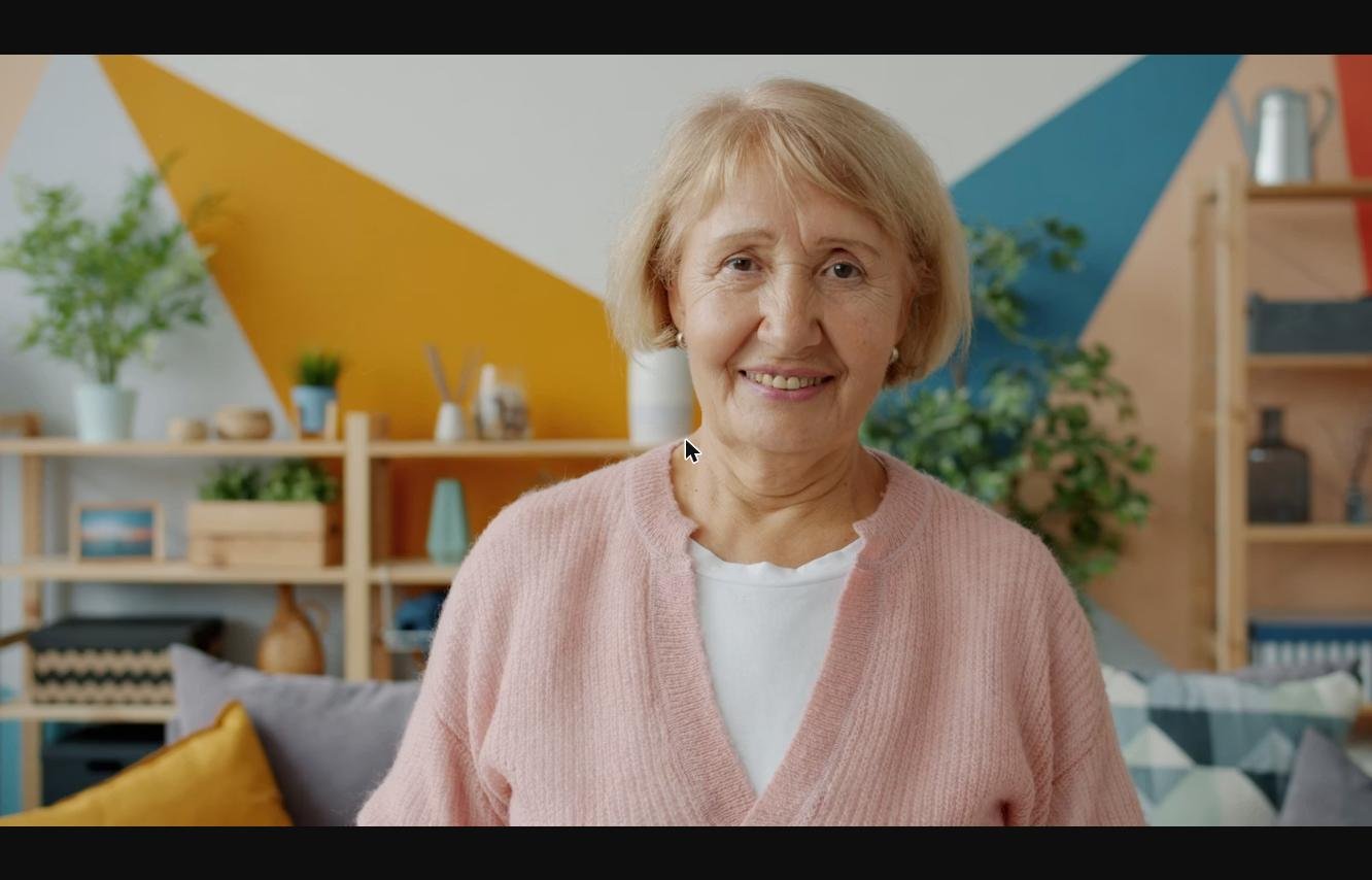 Smiling senior woman at home